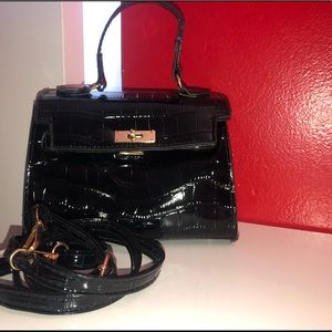 Sleek, Black, Animal Print Purse
